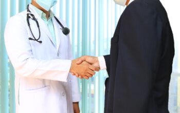 therapist and patient handshake