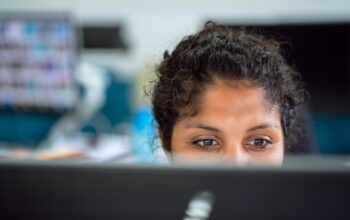 engineers reviewing sustainable blueprints
