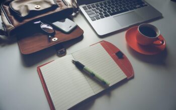 laptop on desk design software open