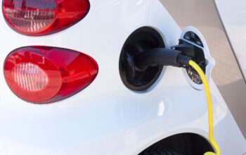 electric cars in cityscape