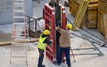 construction workers with digital tablets