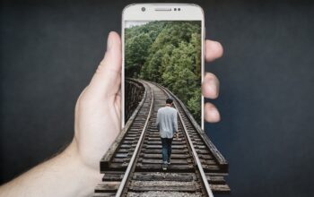 doctor holding smartphone, global network, office workers