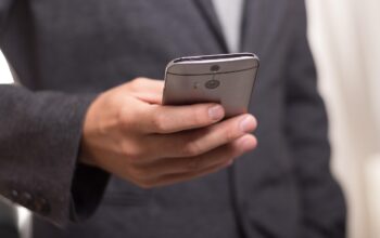 person using smartphone with mental health app