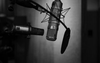 podcast microphones setup, supply chain graphics, diverse interview panel