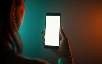 smartphone with finance graphs