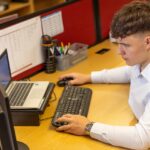office worker laptop focused