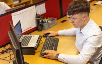 office worker laptop focused