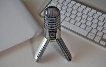 podcast microphones and a plant