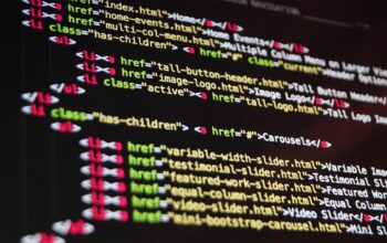 computer screen with code, engineering team, modern workspace