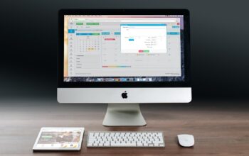 office workspace with digital task boards