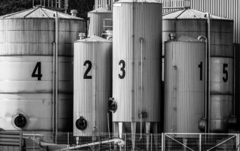 industrial warehouse complex with trucks