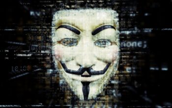 laptop with hacker code and ai graphics