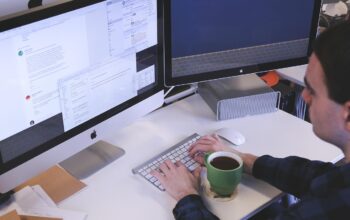 busy recruiter with glowing ai screens