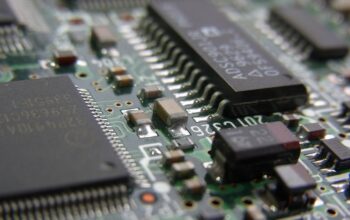 engineers showcasing ai chips at tech expo